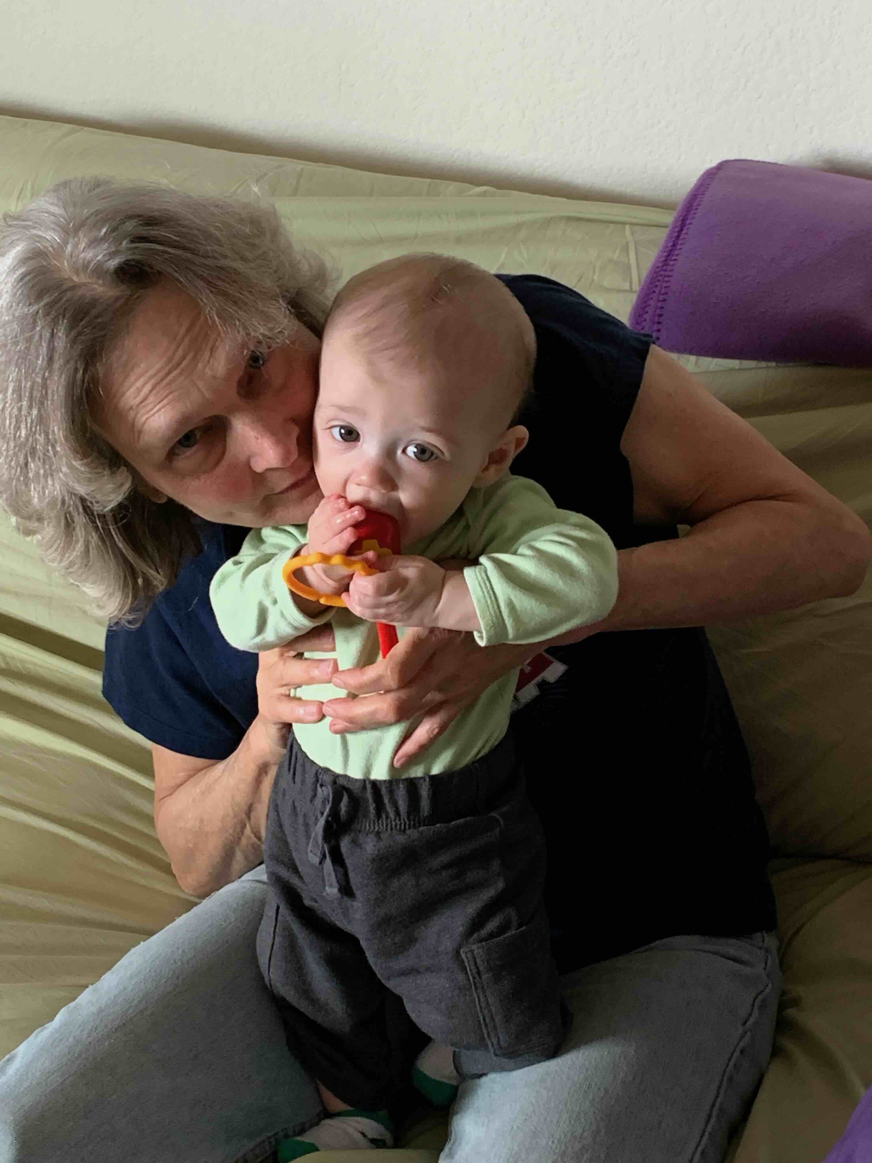 Marcia liked holding her fifth grandchild.