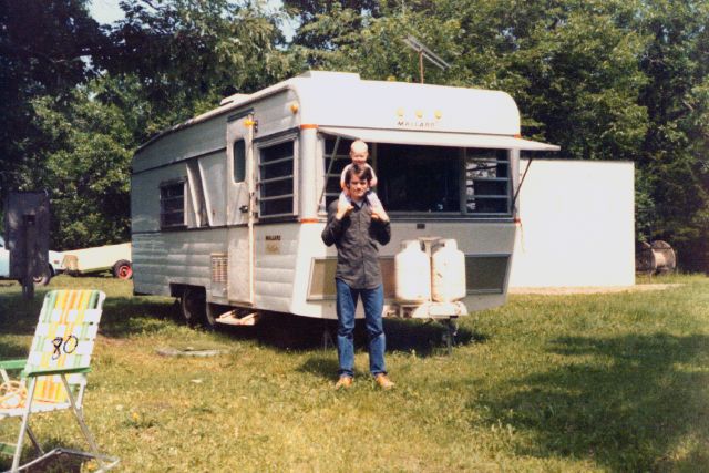 Tim on Al in front of the larger trailer